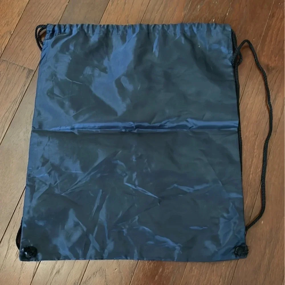 Carnival navy drawstring backpack with a zippered pocket new